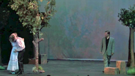Angelique and Anthony kiss as Emil enters